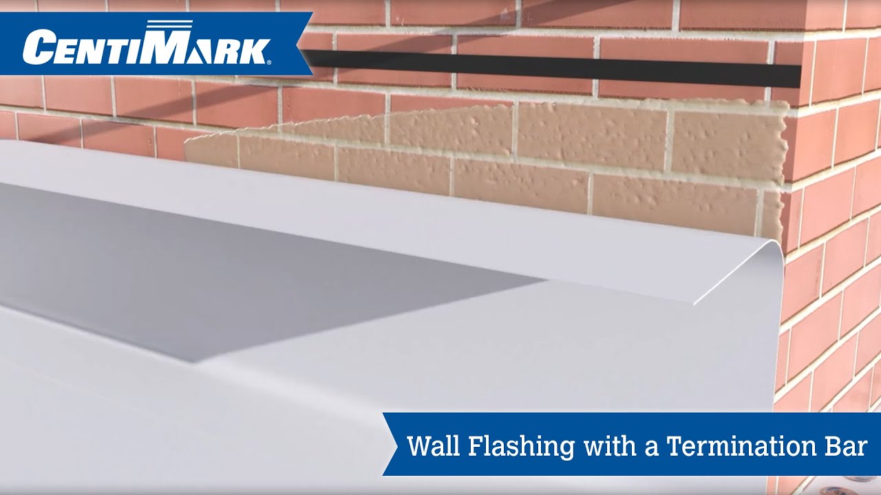 Wall flashing using a termination bar on a commercial roof.