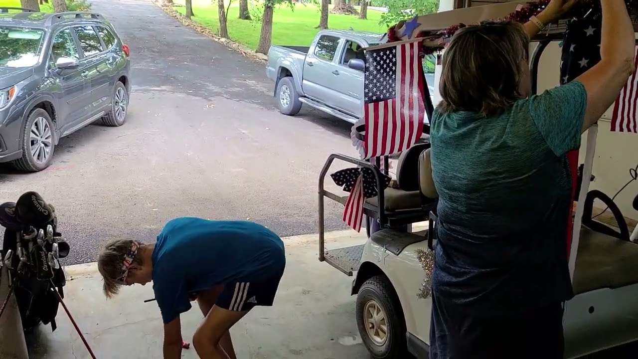 decorating the golf cart for the parade