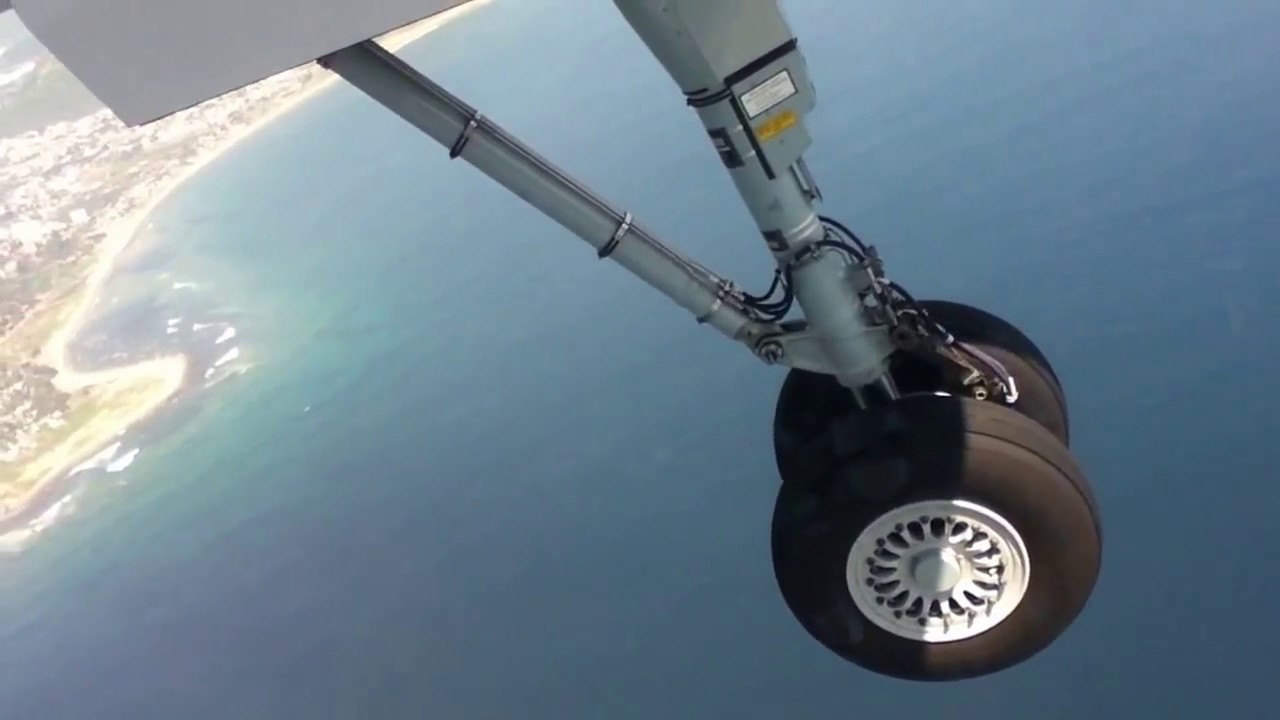 Vizag aerial view between sea and land, Flight rear wheel landing