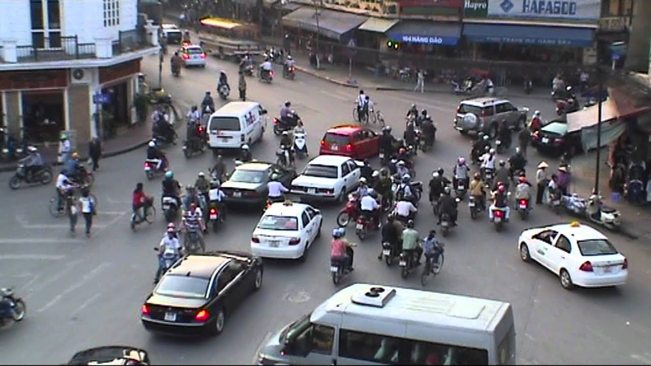 VIETNAM how to cross roads in Hanoi (sd-video).