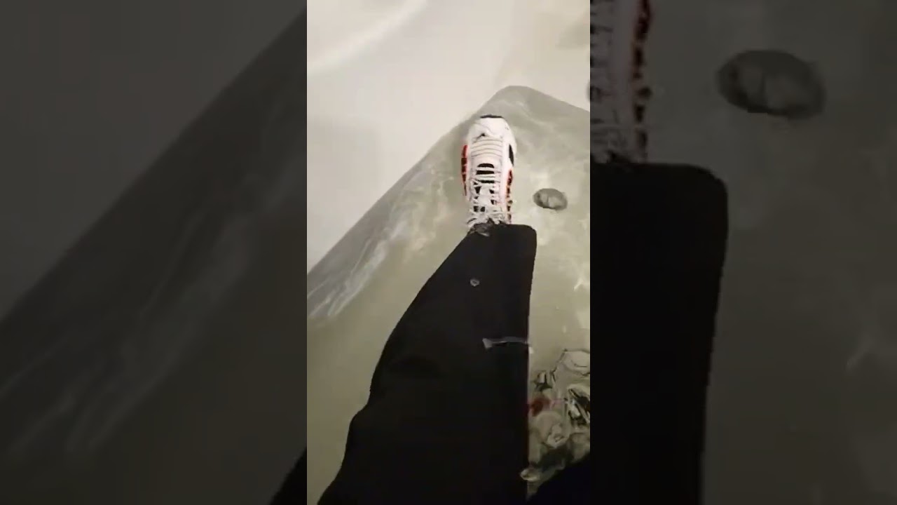Soaking Nike Tailwind 4 in the tub with sweats