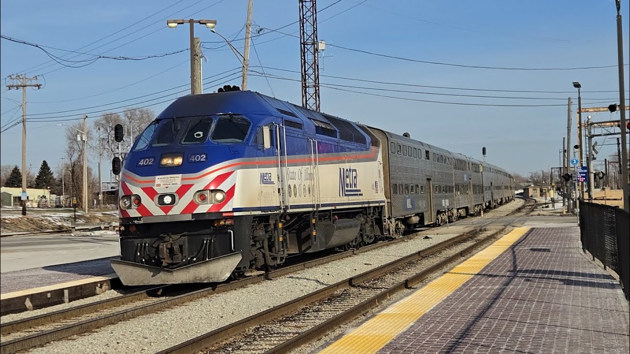 Metra #402 State of Illinois Unit leads RI #411 through Blue Island