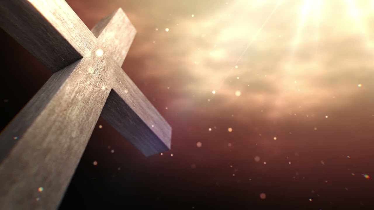 The cross stands on a beautiful twilight video background loop