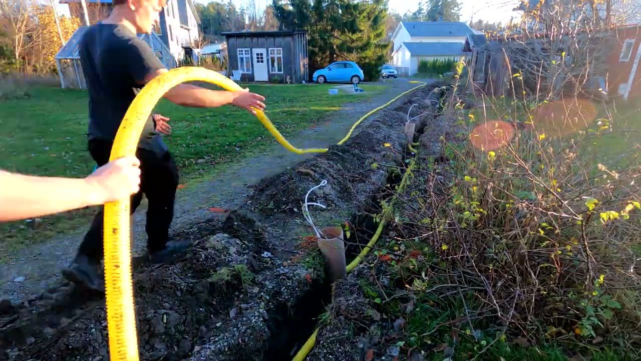 Digging a trench for electric cables with the yanmar