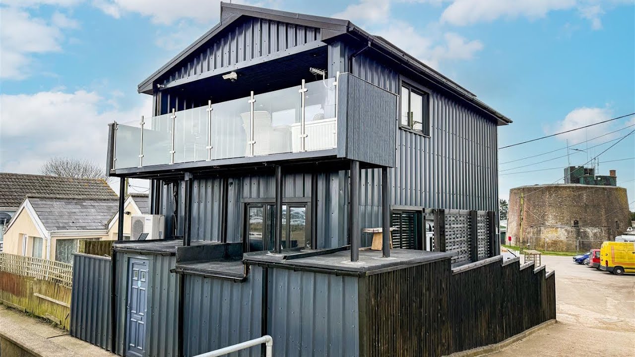 EXTENDED THREE STOREY BEACH HOUSE WITH PANORAMIC ESTUARY VIEWS TOWARDS BRIGHTLINGSEA MARINA