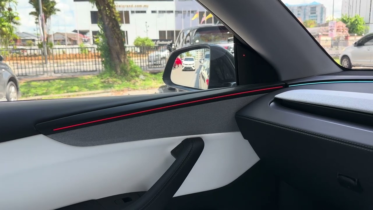 Tesla model y juniper software ￼ update 2026.14.3 safety feature blindspot warning accent light ￼