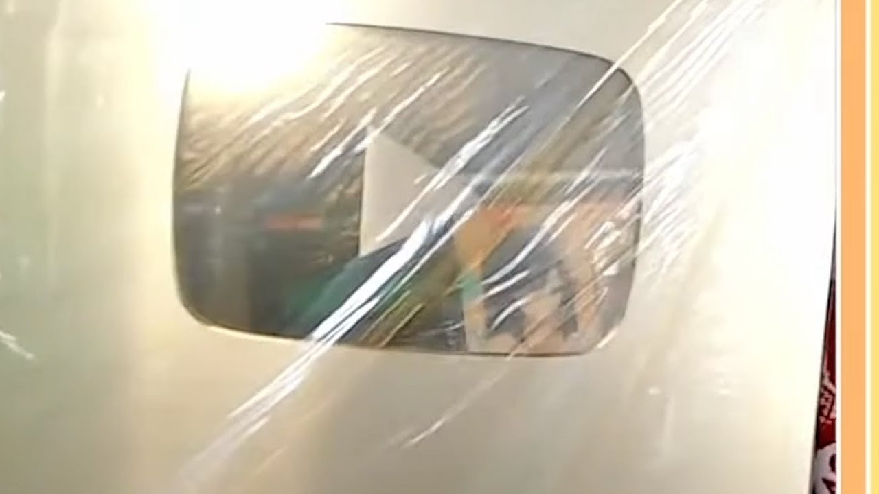 kson, congrats Gold Award! but I can see somthing reflection...?