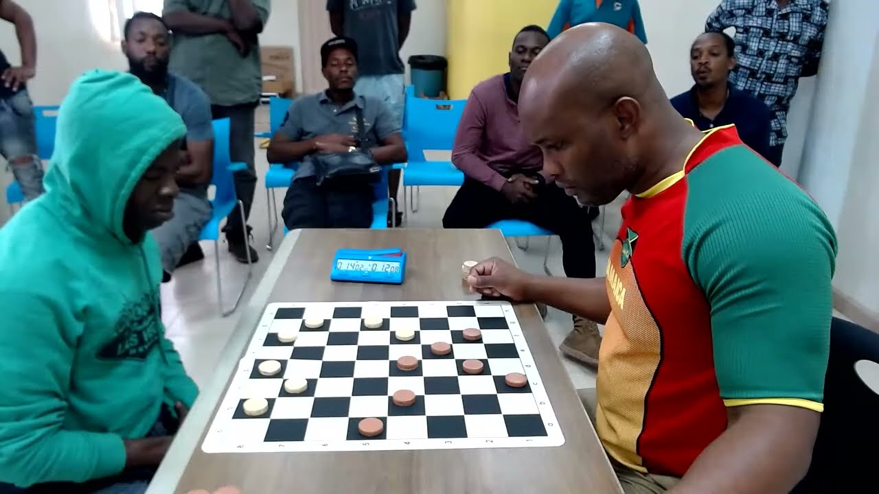 GMI Wayne 'Shines' Reid vs Jermaine 'Tiger' Delattibudiere (Game 15) Draughts in Jamaica