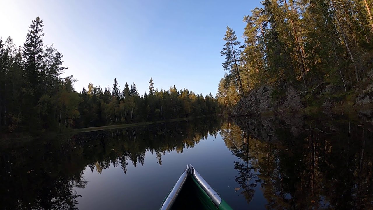 Relaxing canoe paddling in Norway