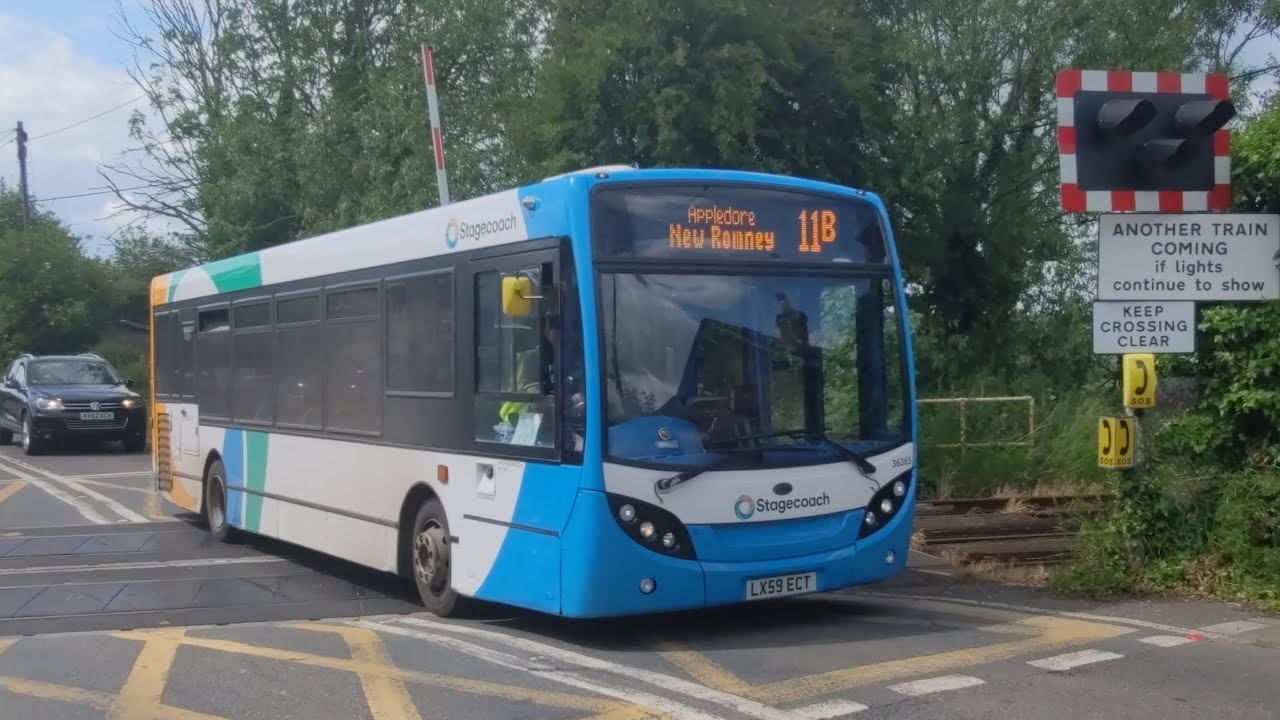 Stagecoach Enviro200 36365 on the 11B at Appledore Level Crossing
