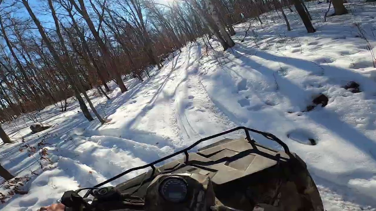 ATVing on our property .