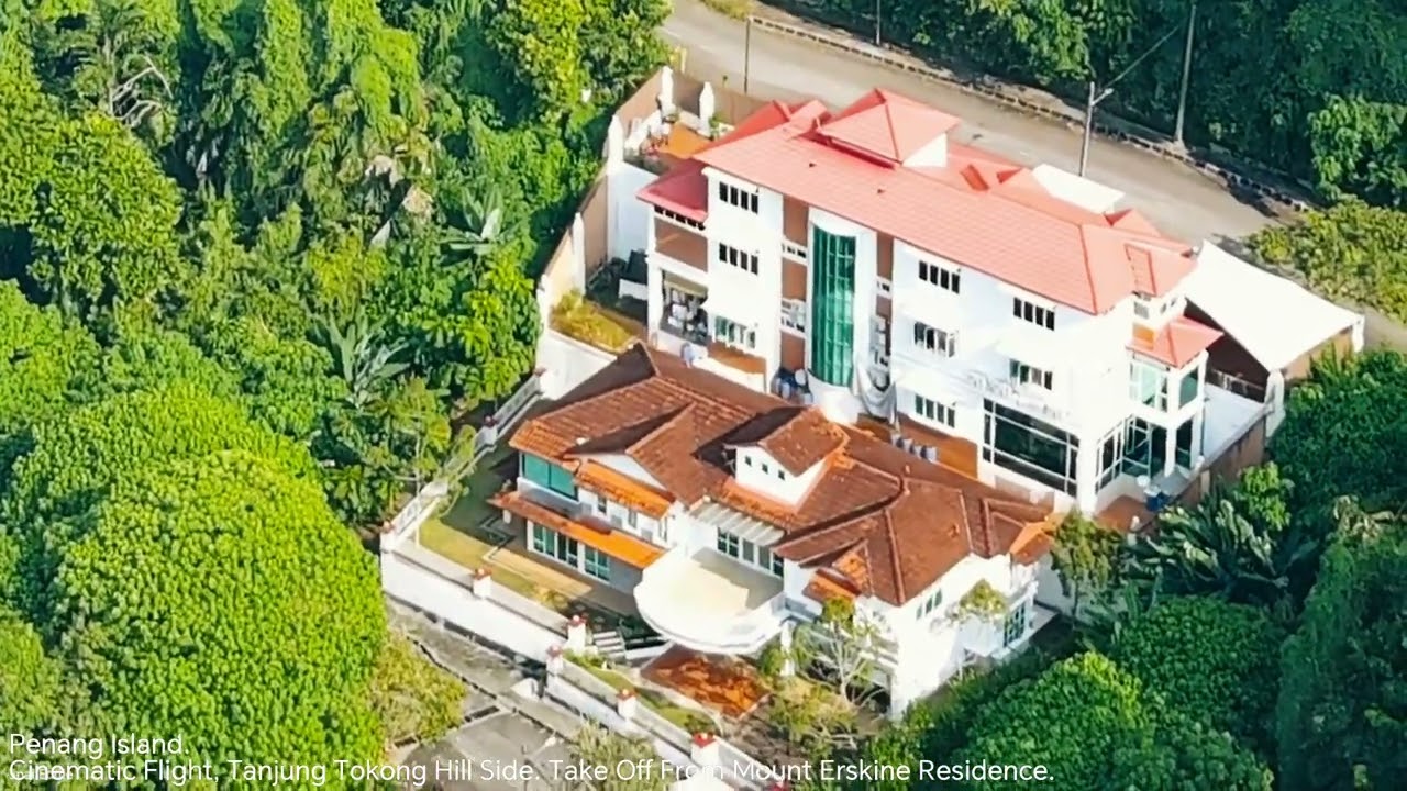 Penang Island. Cinematic Flight, Tanjung Tokong Hill Side. Take Off From Mount Erskine Residence.