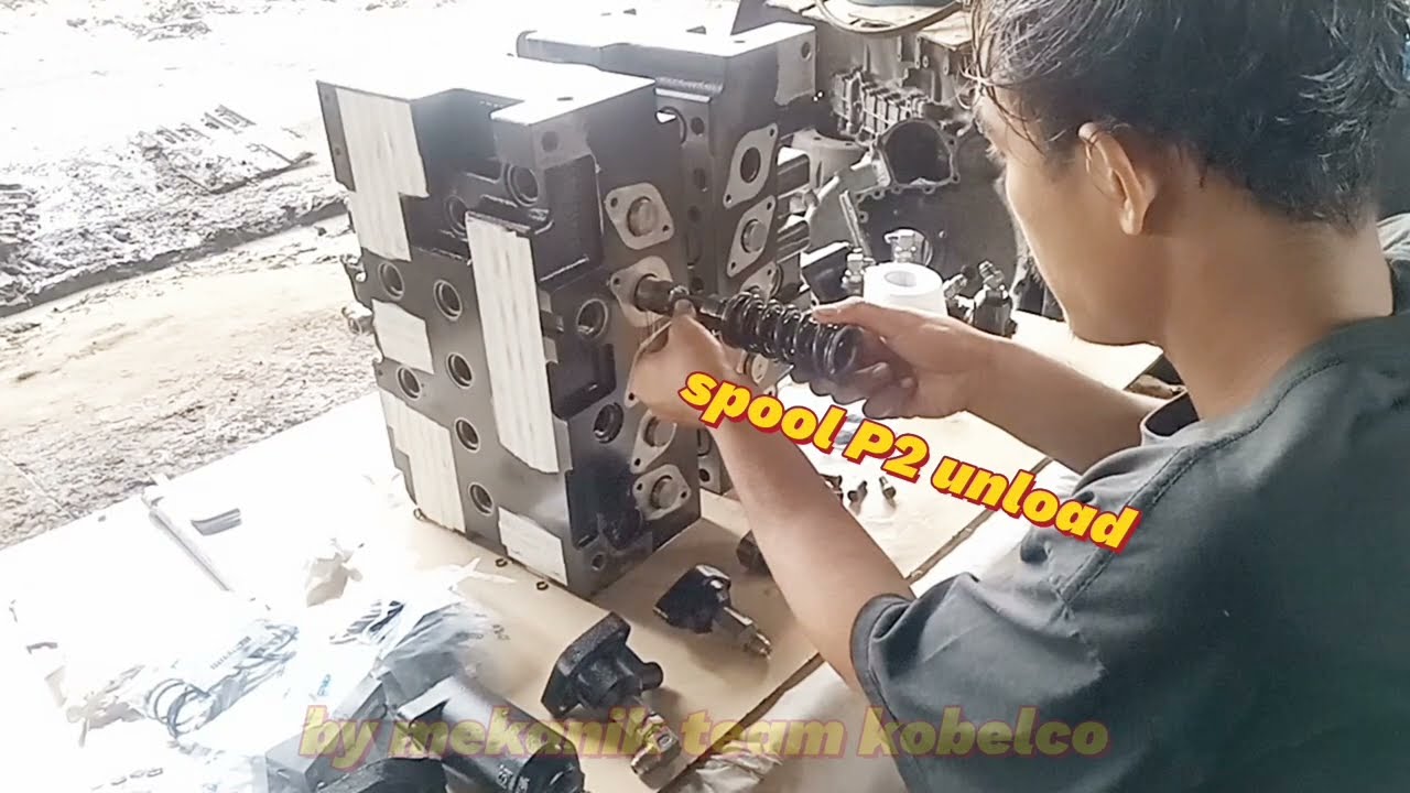 bongkar pasang control valve kobelco sk200-8
