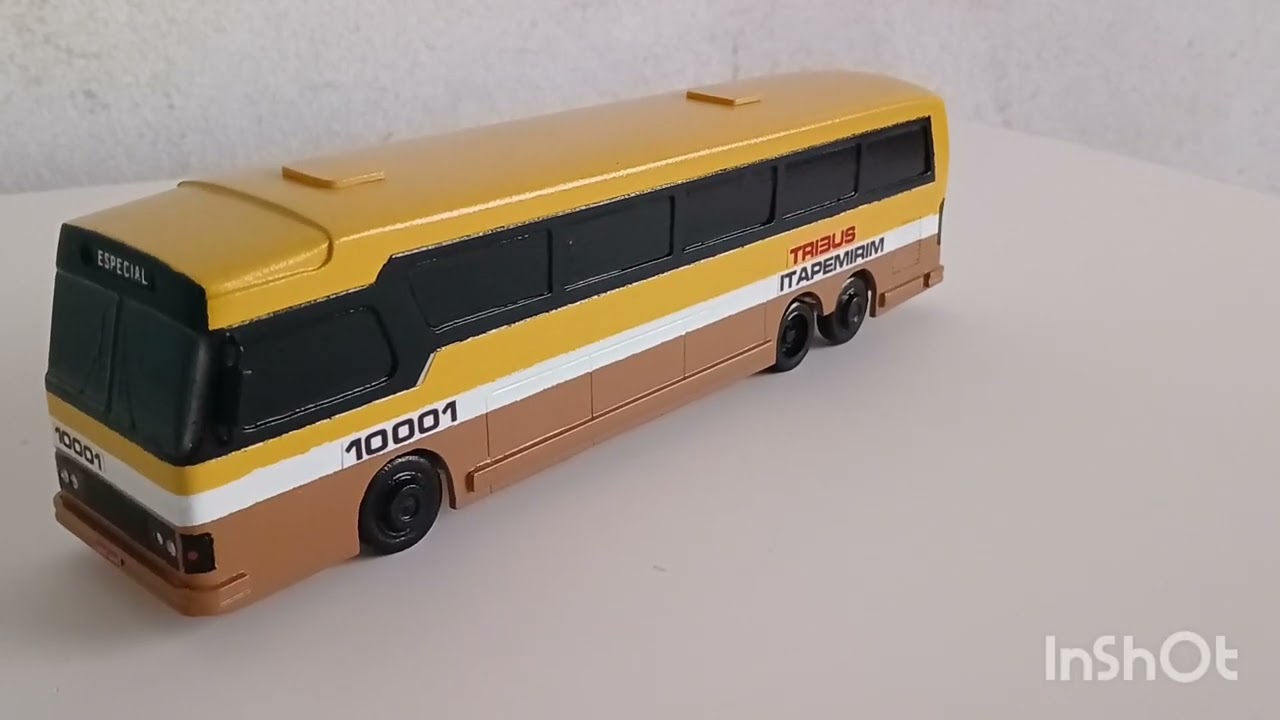 Miniatura de ônibus ciferal dinossauros