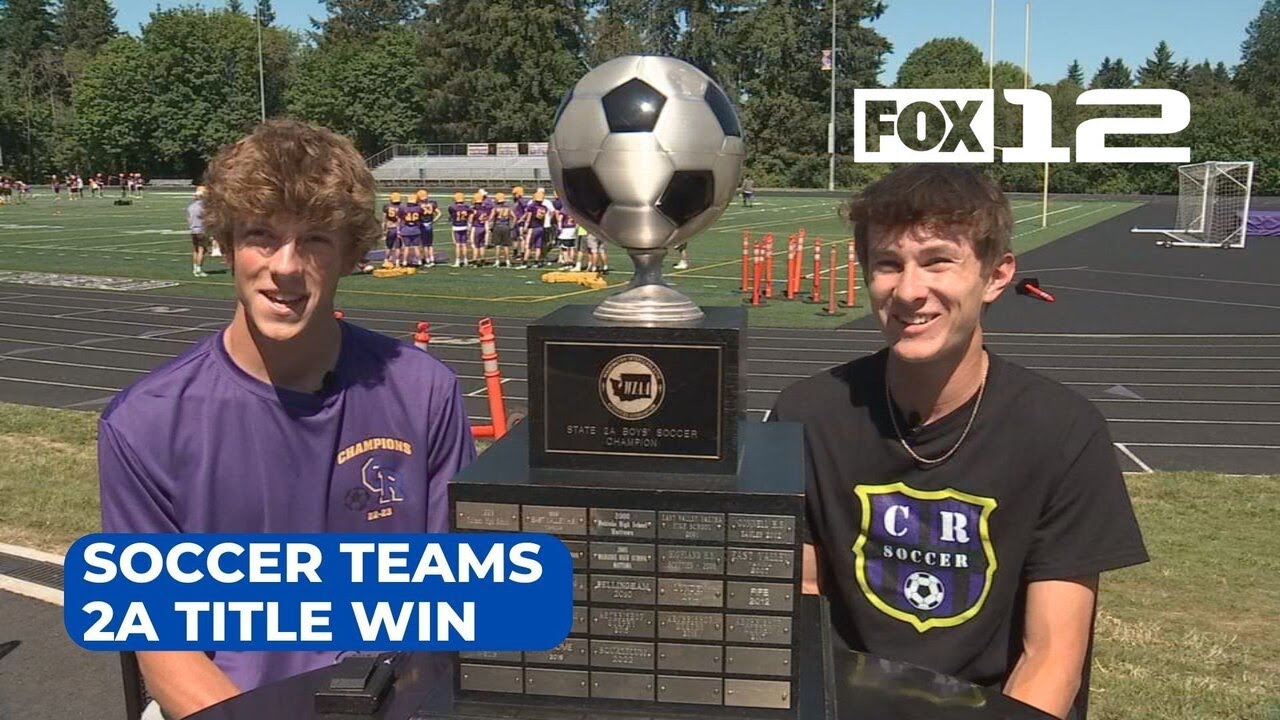 Columbia River HS senior soccer players celebrate teams 2A title win