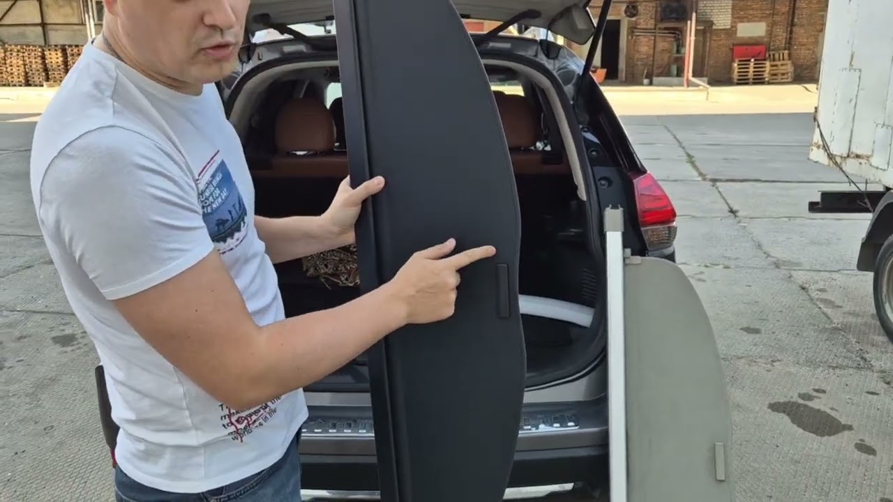 Шторка багажника Nissan Rogue / X‐Trail порівння оригінальної і шторки виробництва Тайвань