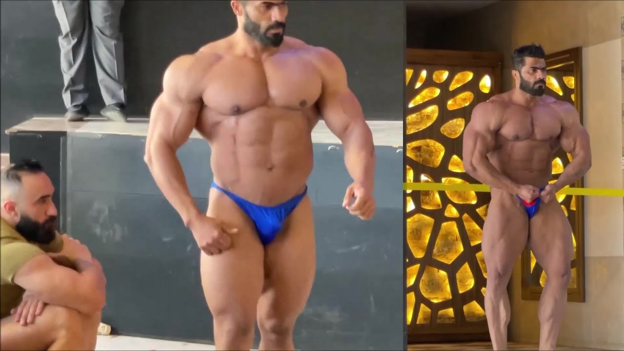 Massive Iraqi bodybuilder Ali Al Zarkani - Posing for the judges