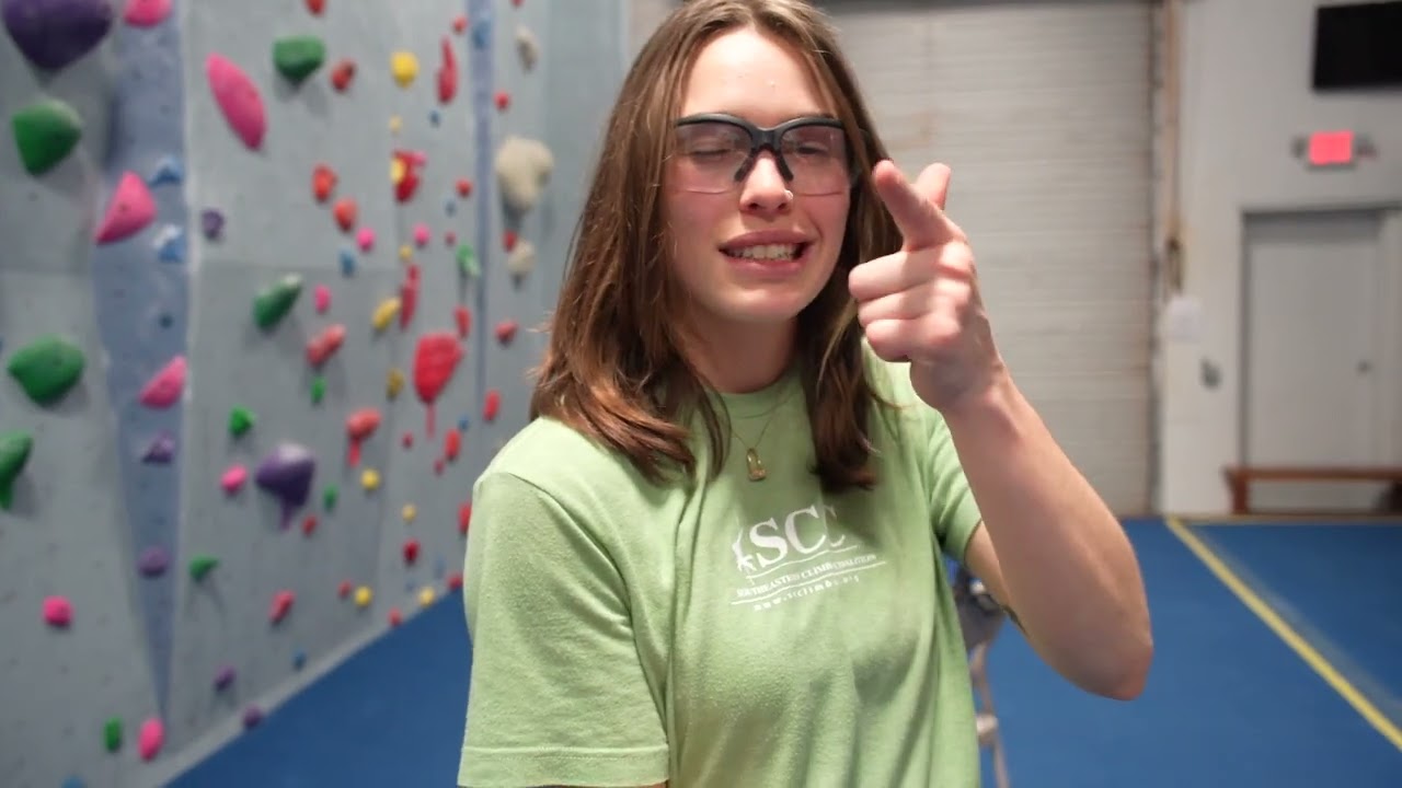 Vertical South setter Gigi sets a V5 with a slight overhang - Boulder Routesetting