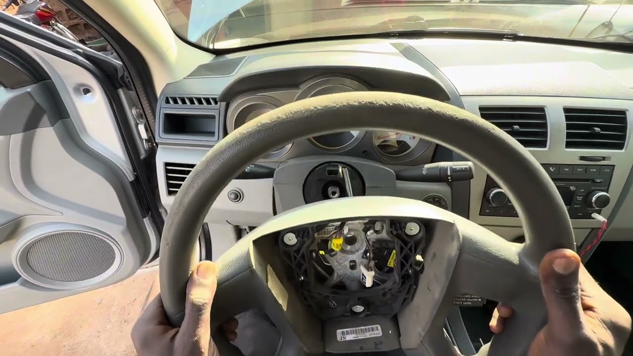 How to remove 2008 Dodge Avenger horn plate 