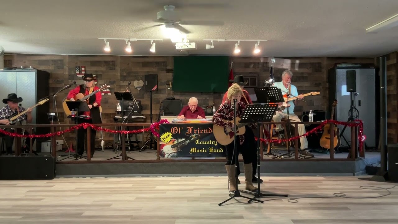 Jean singing at New Ol Friends,  One Little Rose