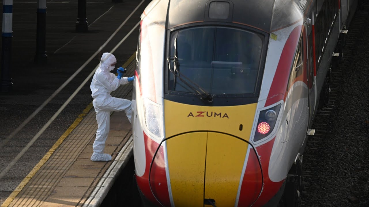 Two men arrested after shocking knife attack on a UK train