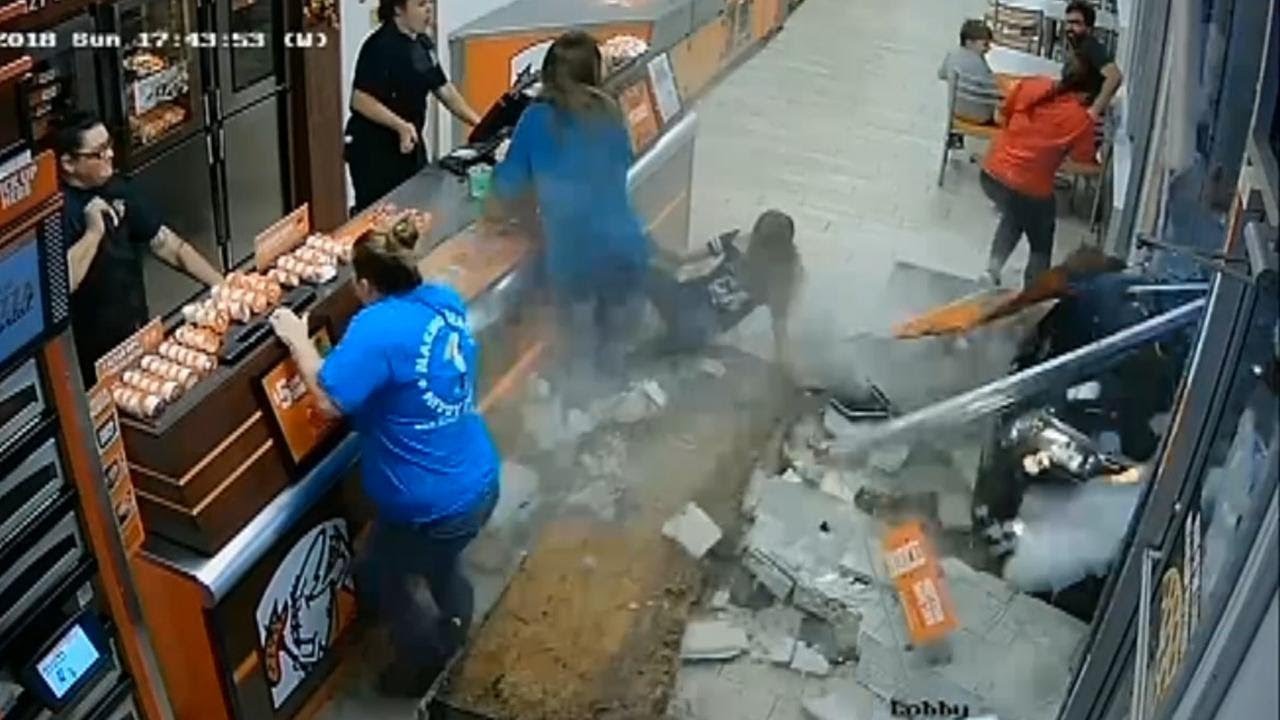 Car Crashes into Little Caesars