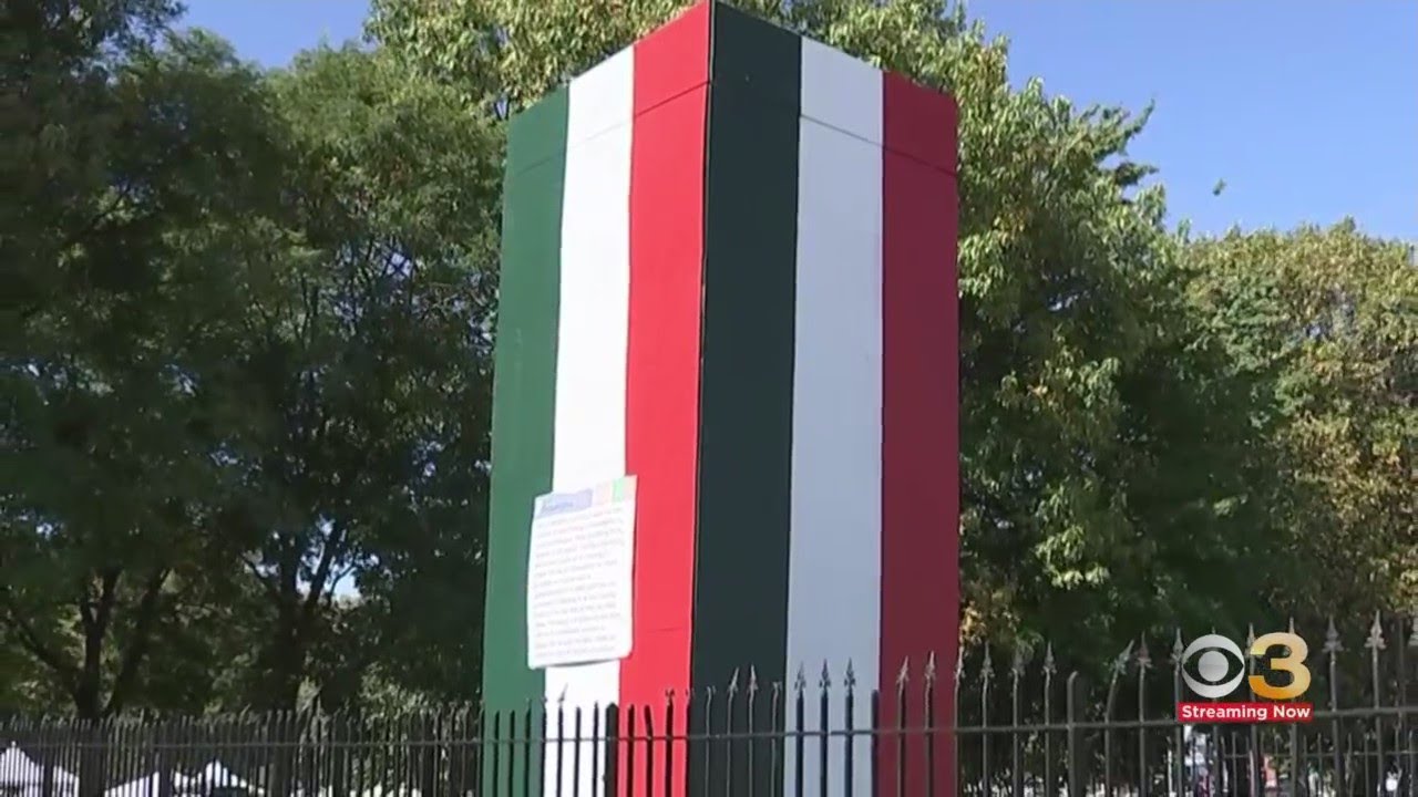 Italian flag painted on Christopher Columbus statue at Marconi Plaza