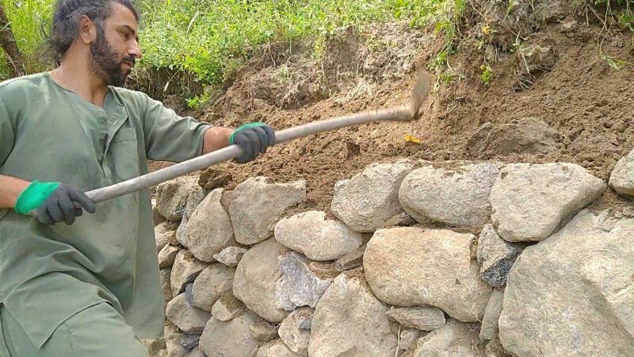 It took 3 days to rebuild our fallen stone field wall