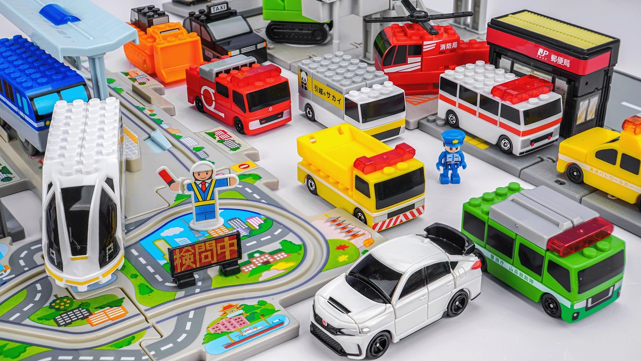 トミカ・プラレール 組み立ておもちゃ ☆ 鍵で開く扉付きボックスに入ったトミカ組み立てカーコレクション｜トミカシティの交差点を建設