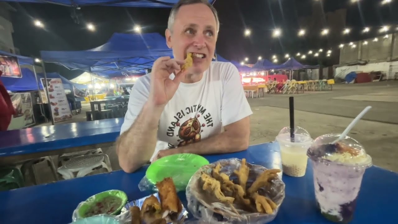 Foreigner tries street food in the Philippines. Does he like it?