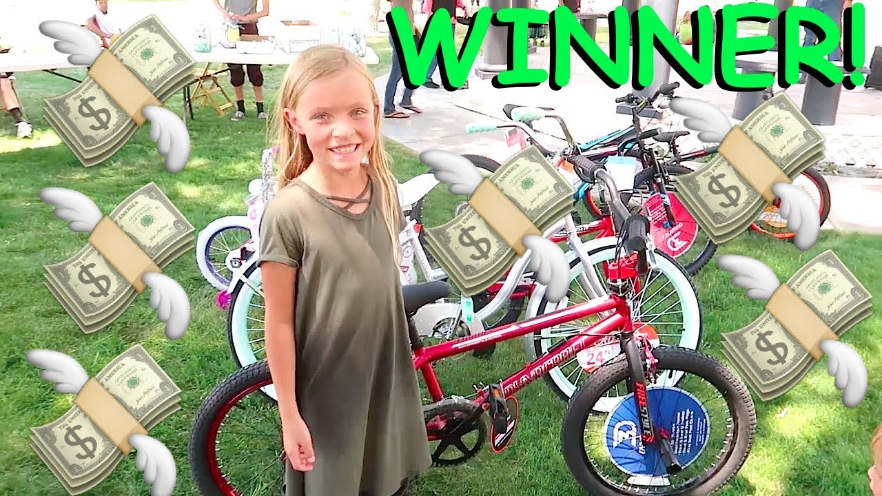 Kid Catches Money and WINS a BIKE!