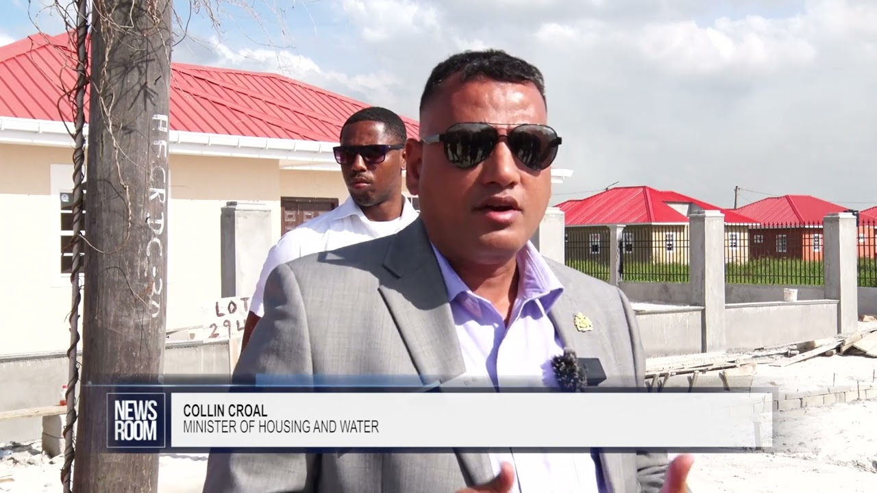GUYANA NEWS ROOM - EXCITED HOMEOWNERS RECEIVE KEYS TO YOUNG PROFESSIONAL HOUSES
