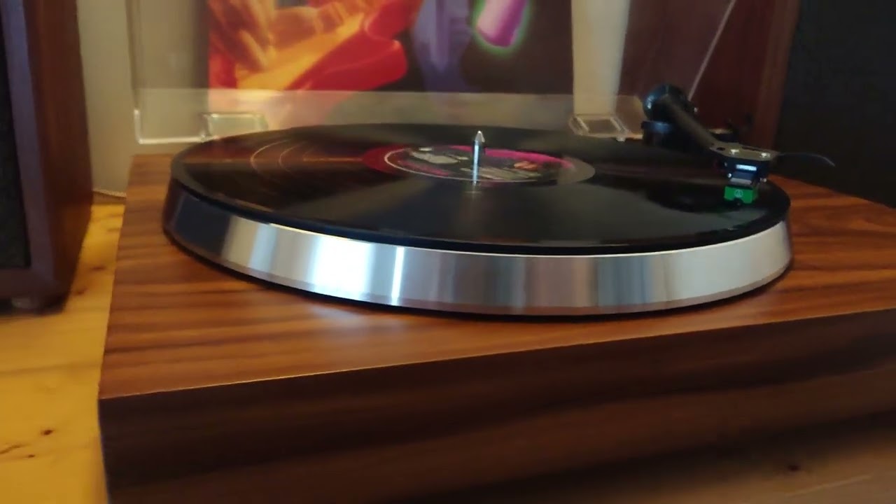 Rotel RP-830 with Audio Technica At95e in a beautiful walnut veneer