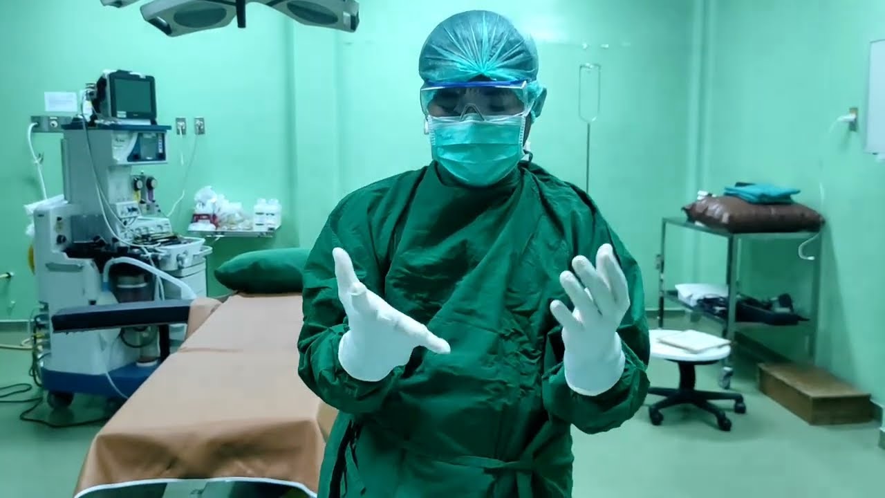 Cara Memakai Jas Operasi & Sarung Tangan Bedah(how to wear a surgical gawn and surgical glove)
