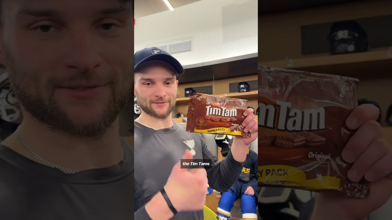 Nathan Walker introduces teammates to Tim Tams