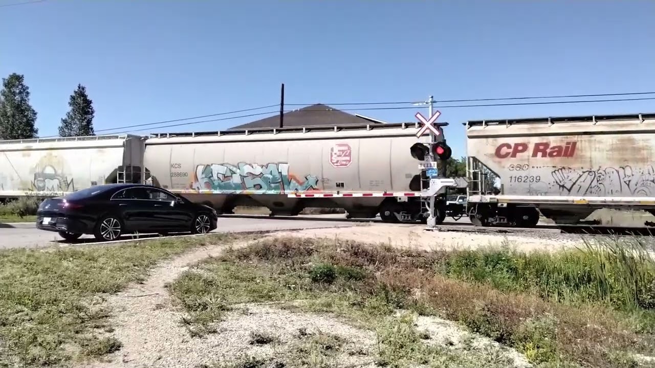 CN in the lead!!! CPKC Train Crossing Peguis St (8/ 16/ 25)