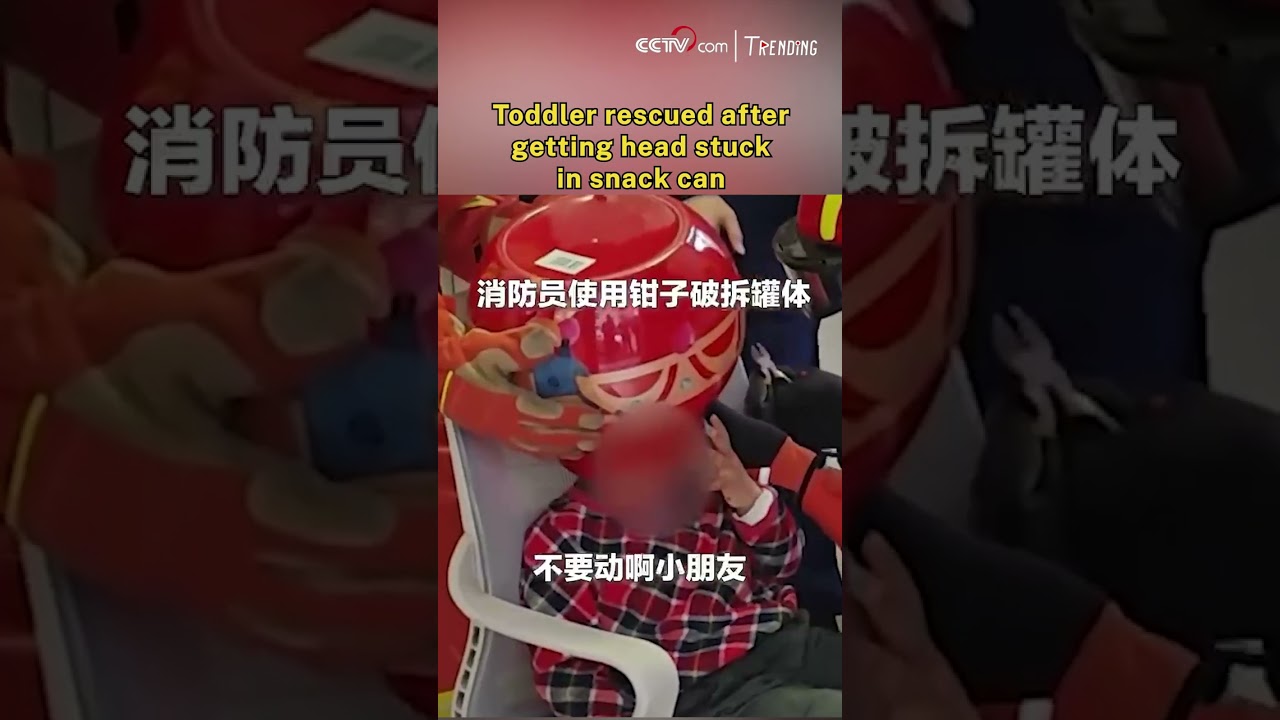 Toddler rescued after getting head stuck in snack can
