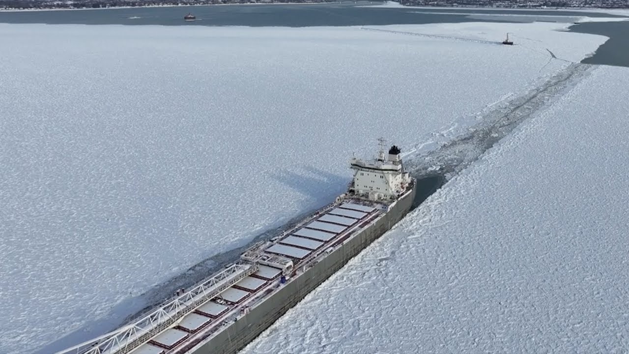 Freighter stuck in Lake Erie ice off Buffalo shoreline; Ice-breaking tug arrives to assist