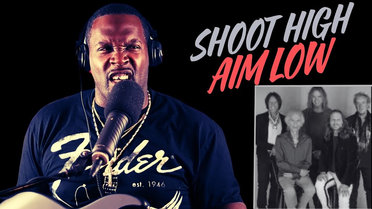 YES - SHOOT HIGH,AIM LOW (REACTION)