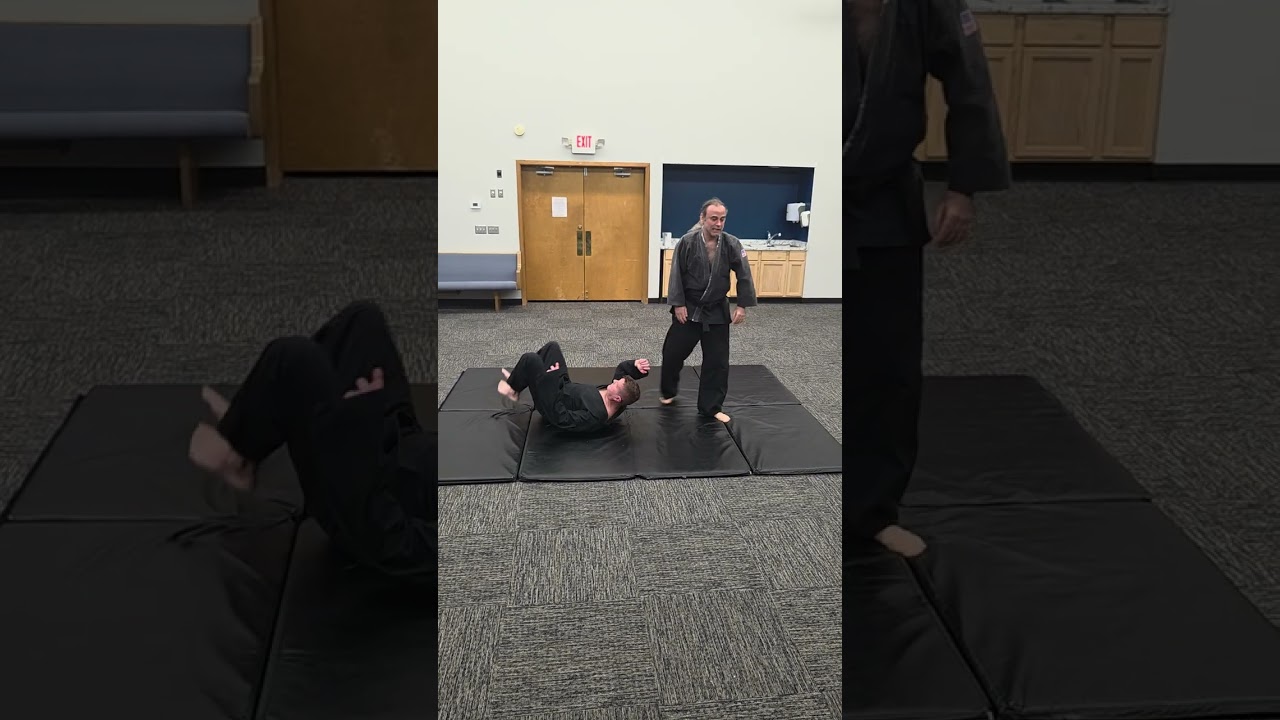 Twisting wrist lock and takedown 