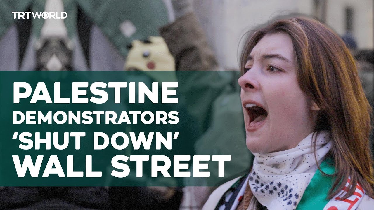 Massive crowd of pro-Palestine demonstrators march to Wall Street