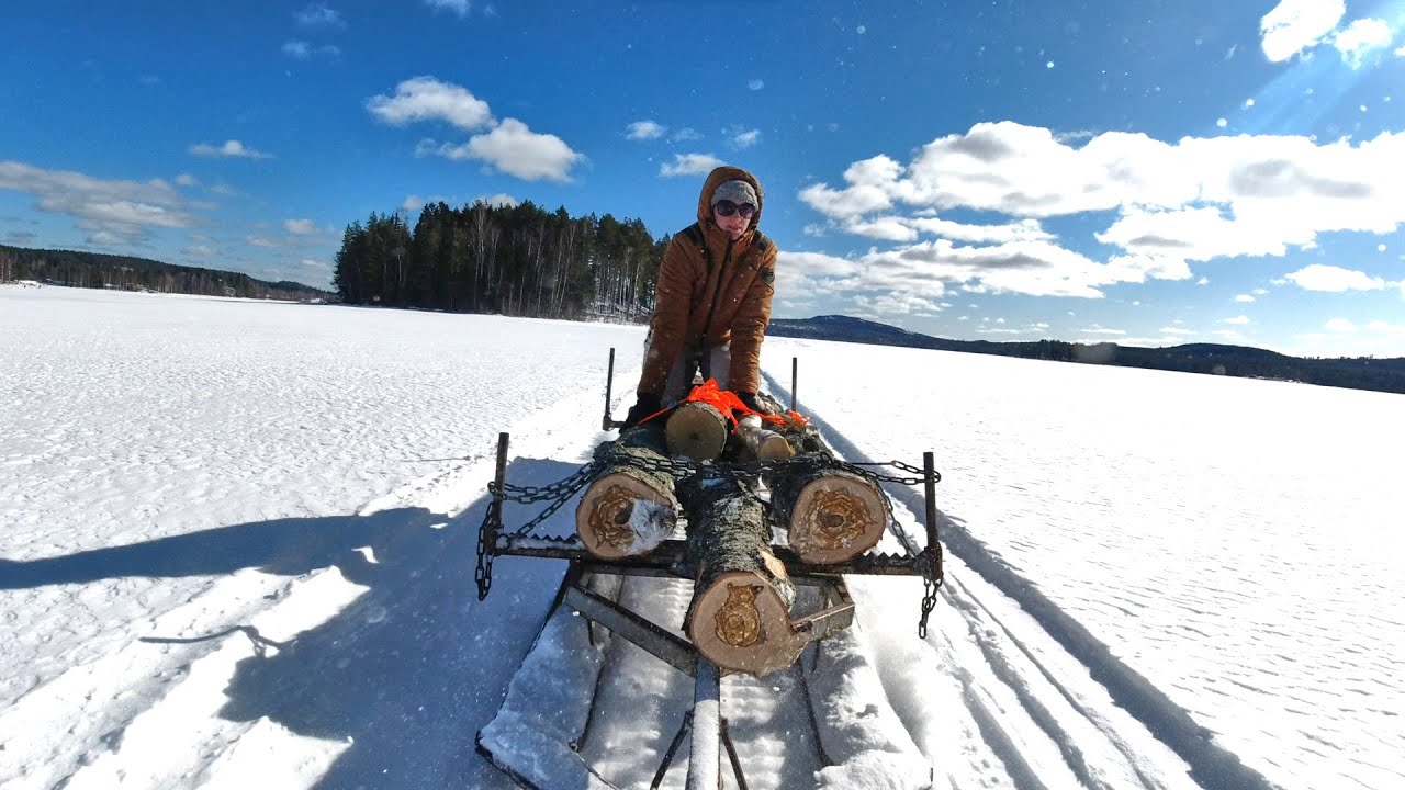 Logging With The Snowmobile, On A Frozen Lake...