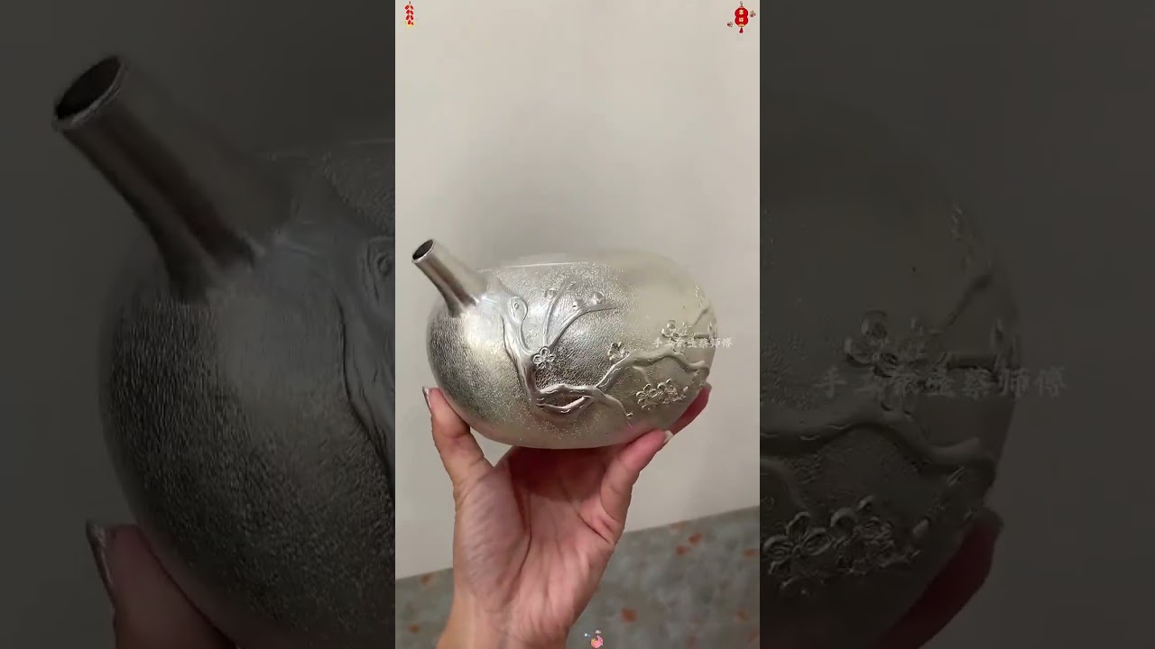 Do you like the finished gilded plum blossom silver teapot custom-made by a lady from