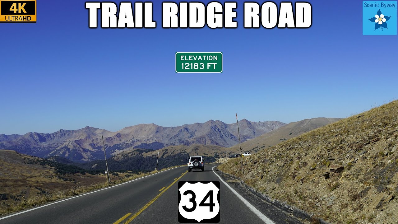 Проезд по трассе Trail Ridge Road в национальном парке Роки-Маунтин в Колорадо (12 183 фута)