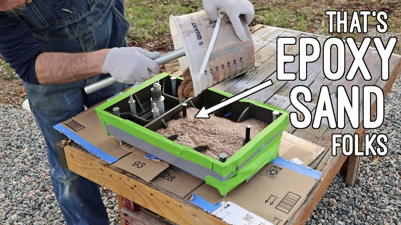 Filling my milling machine with epoxy sand to increase rigidity.