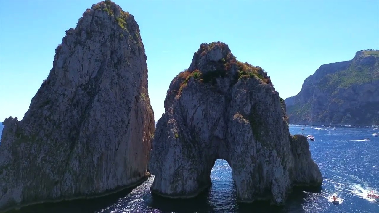 Capri Boat Tour to Faraglioni Rock cliffs and around the island