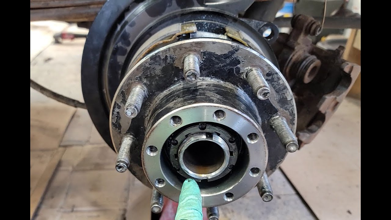 Axle Shaft, Wheel Bearing / Seal, and Parking Brake Removal / Replacement   Dodge Ram 2500 Truck
