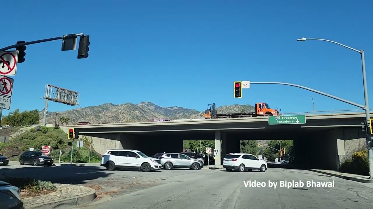 City of Arcadia, Los Angeles County: Driving thru streets with San Gabriel Mountains in background.
