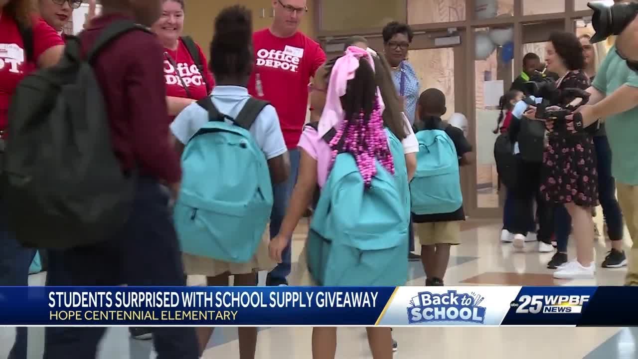 Students at Hope Centennial Elementary receive backpacks full of school supplies