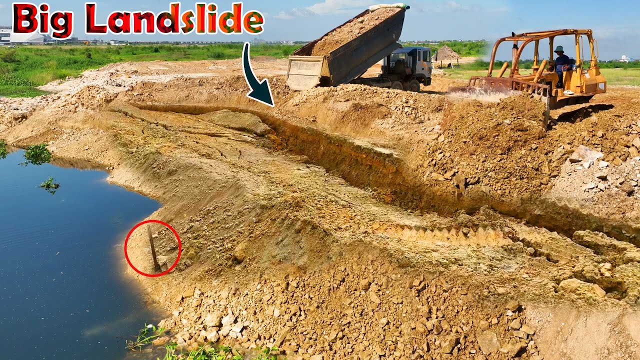 Incredible landslide! Pushed down again, repaired again with 25T rock truck and Komatsu D58E Dozer